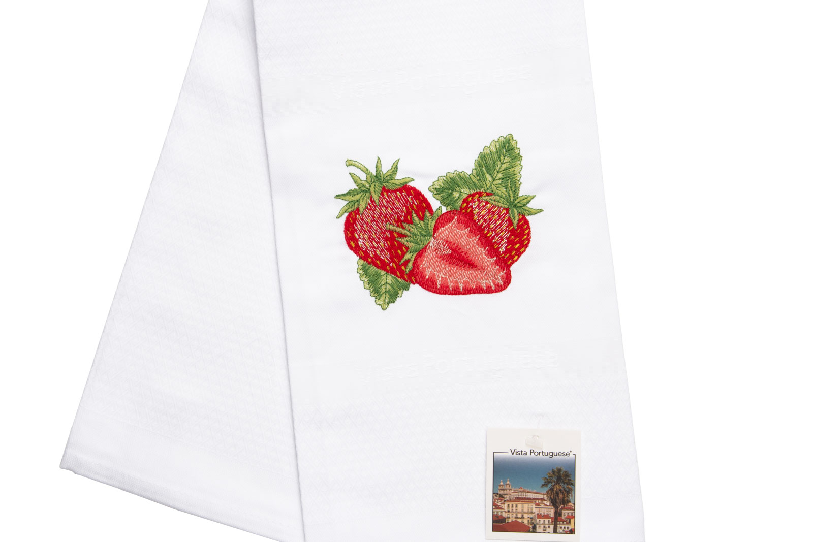 Ausschnitt des Geschirrtuch Strawberry / Erdbeere 50x70cm von Vista Portuguese. Es ist ein weißes Geschirrhandtuch aus Jacquardstoff mit aufgesticktem Erdbeermotiv.