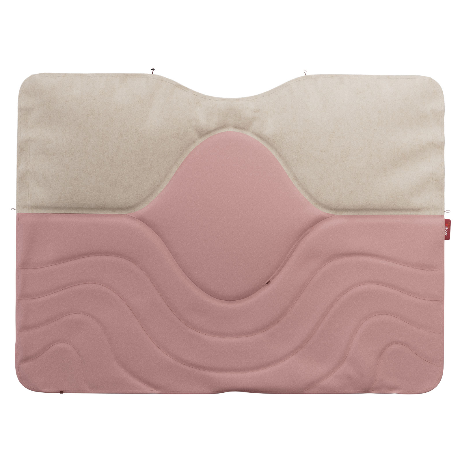 Die Huge Hug Heizdecke Original Soft Pink liegt ausgebreitet. Der obere Teil hat ein helles Beige und der untere ein sanftes Rosa.