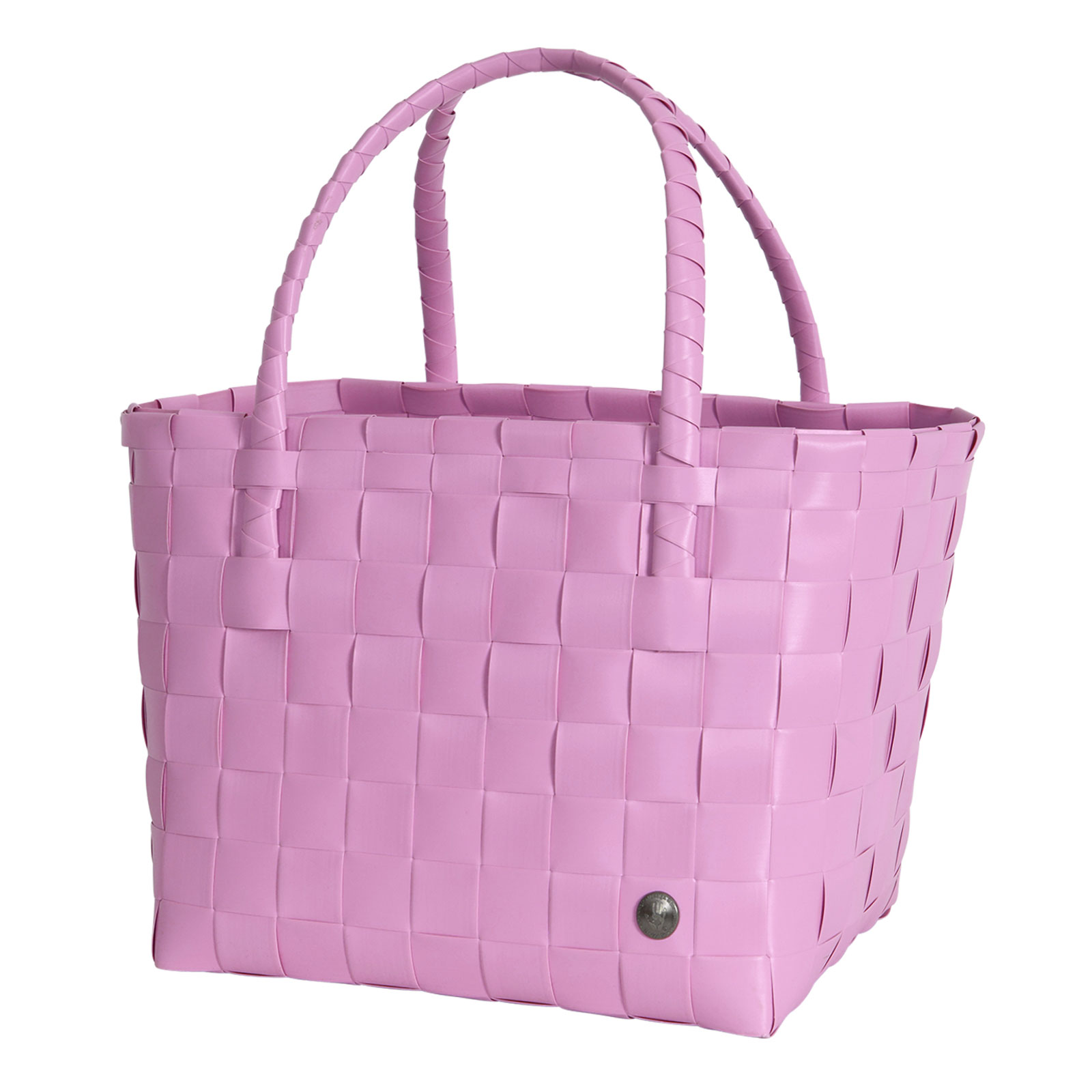 Der Paris Shopper fuchsia pink ist gewebt aus flachen babypinken Kunststoffsträngen und hat zwei Henkel zum Tragen.
