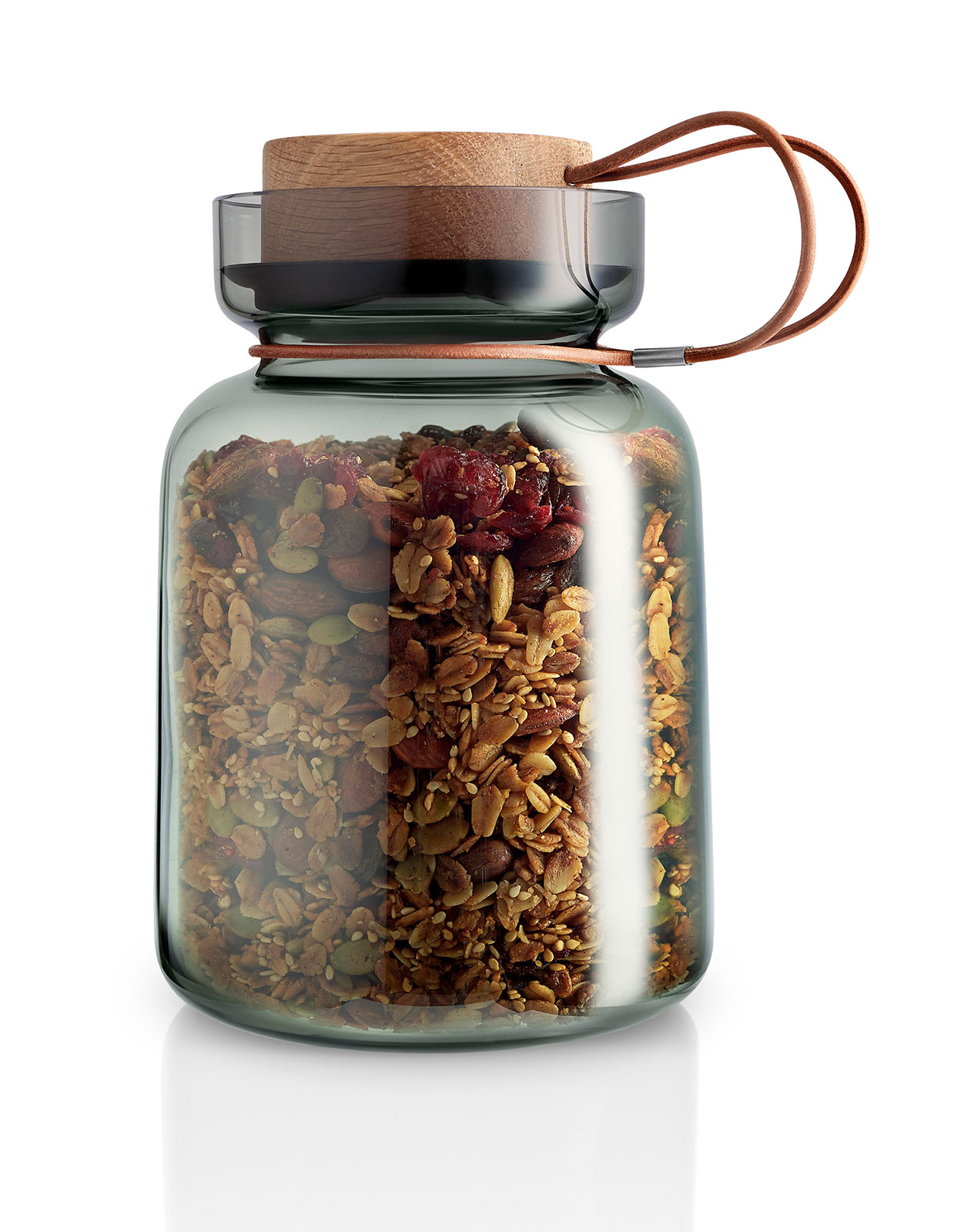 Das grüne Vorratsglas gefüllt mit Müsli.